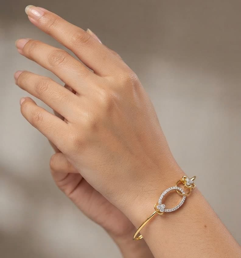 The Interlocking Linked Circles Diamond and Gold Bangle — image 1